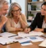 Retiring couple reviewing Medicare enrollment dates, HSA timing, and healthcare paperwork with an educator